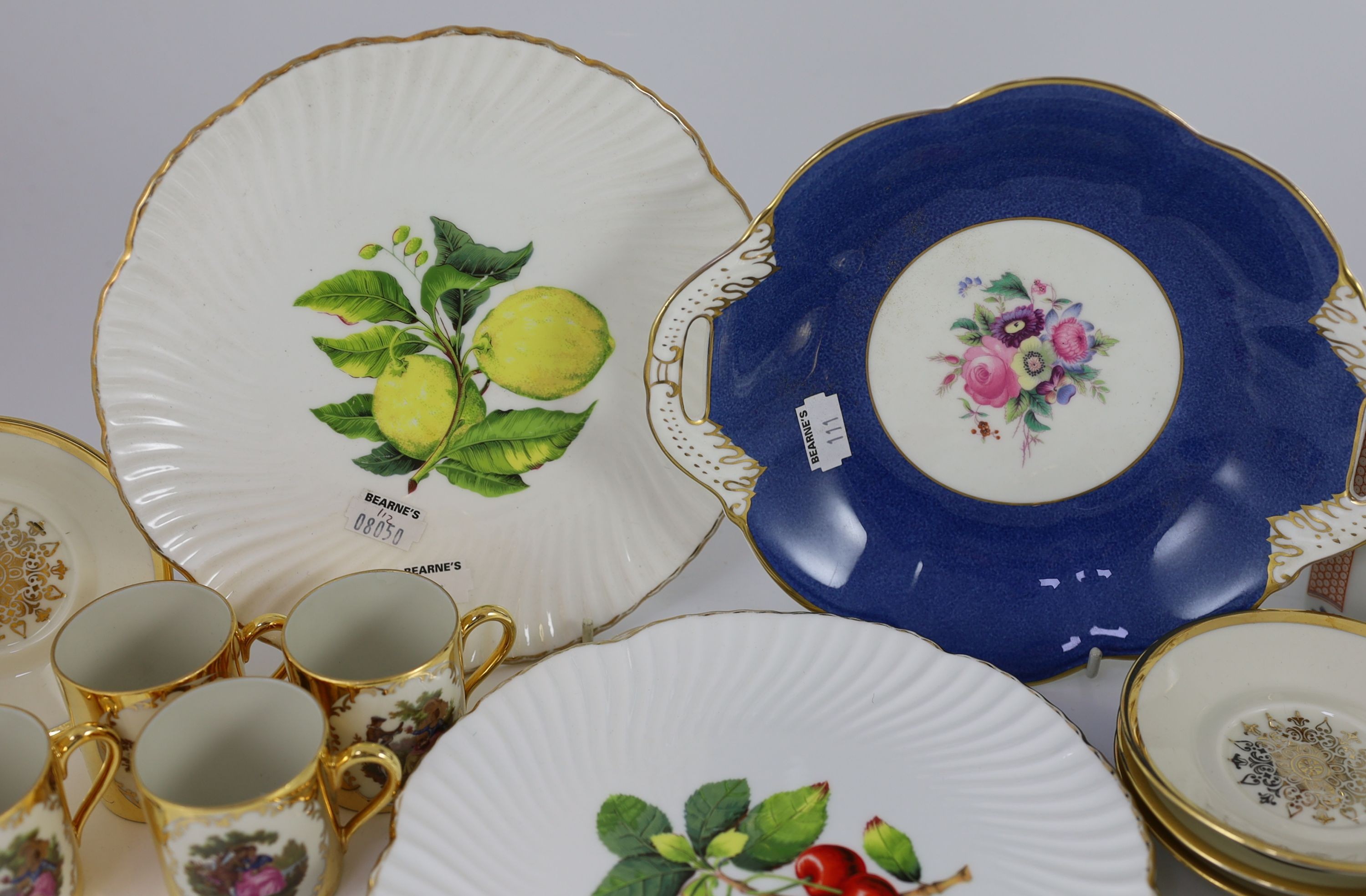 A set of eight German gold ground coffee cans and saucers